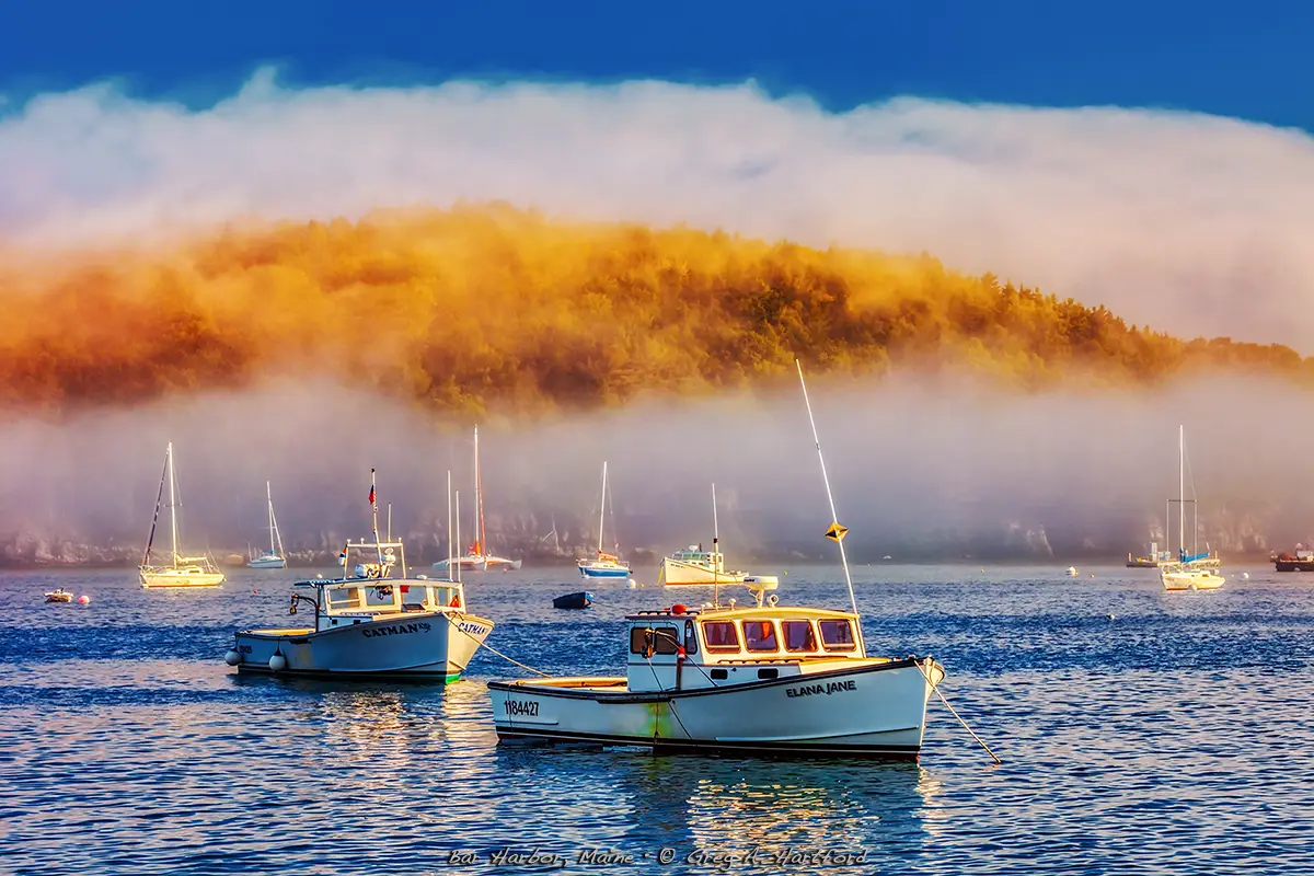 Maine lobster boats in Bar Harbor, Maine with heavy fog.