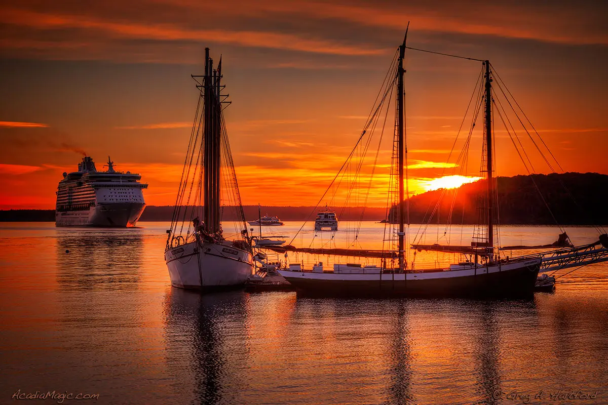 Sunrise in Bar Harbor, Maine with schooner and cruise ship
