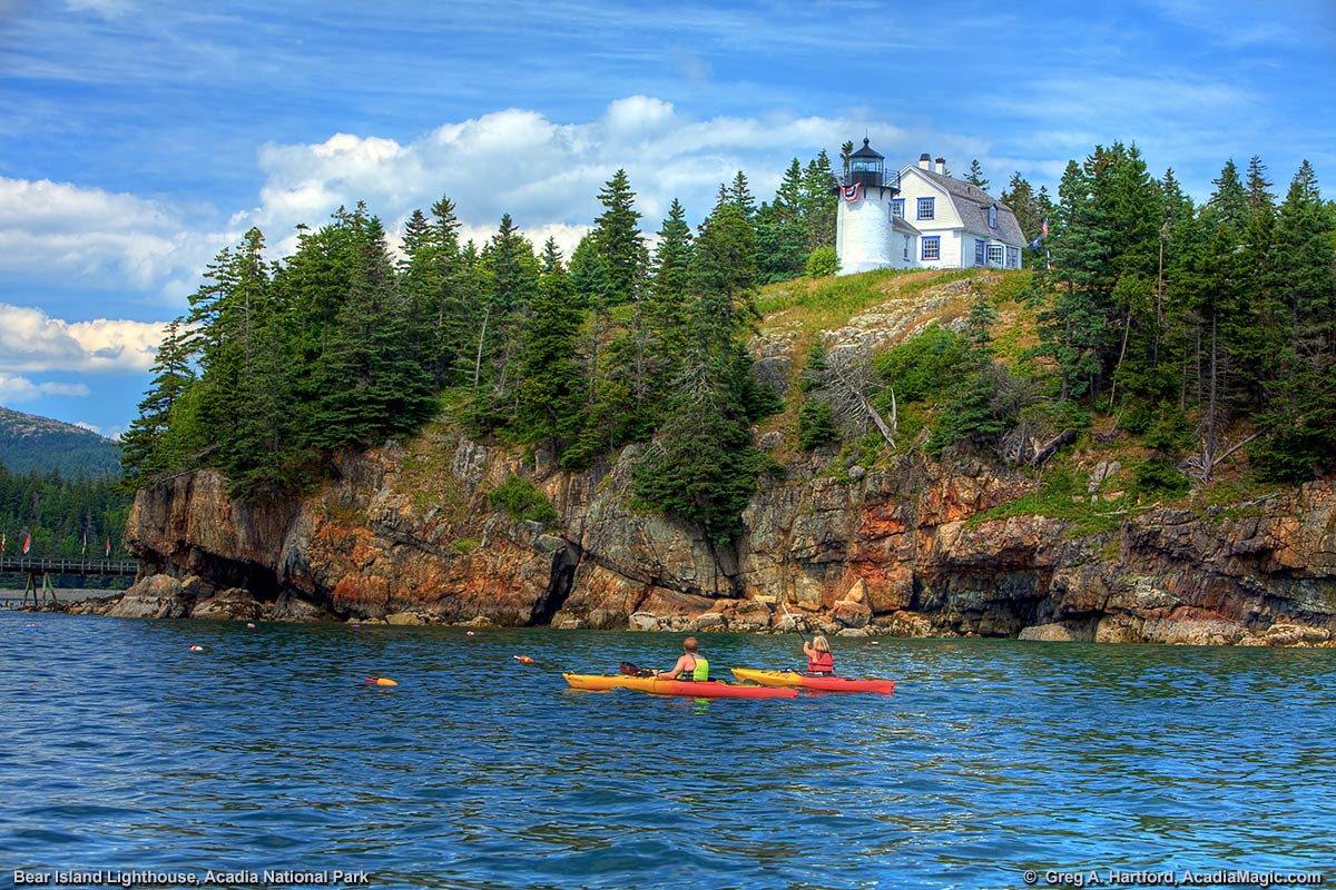 Kayakers get a close-up view of the Bear Island Lighthouse at the southern side of Mount Desert Island, Maine.