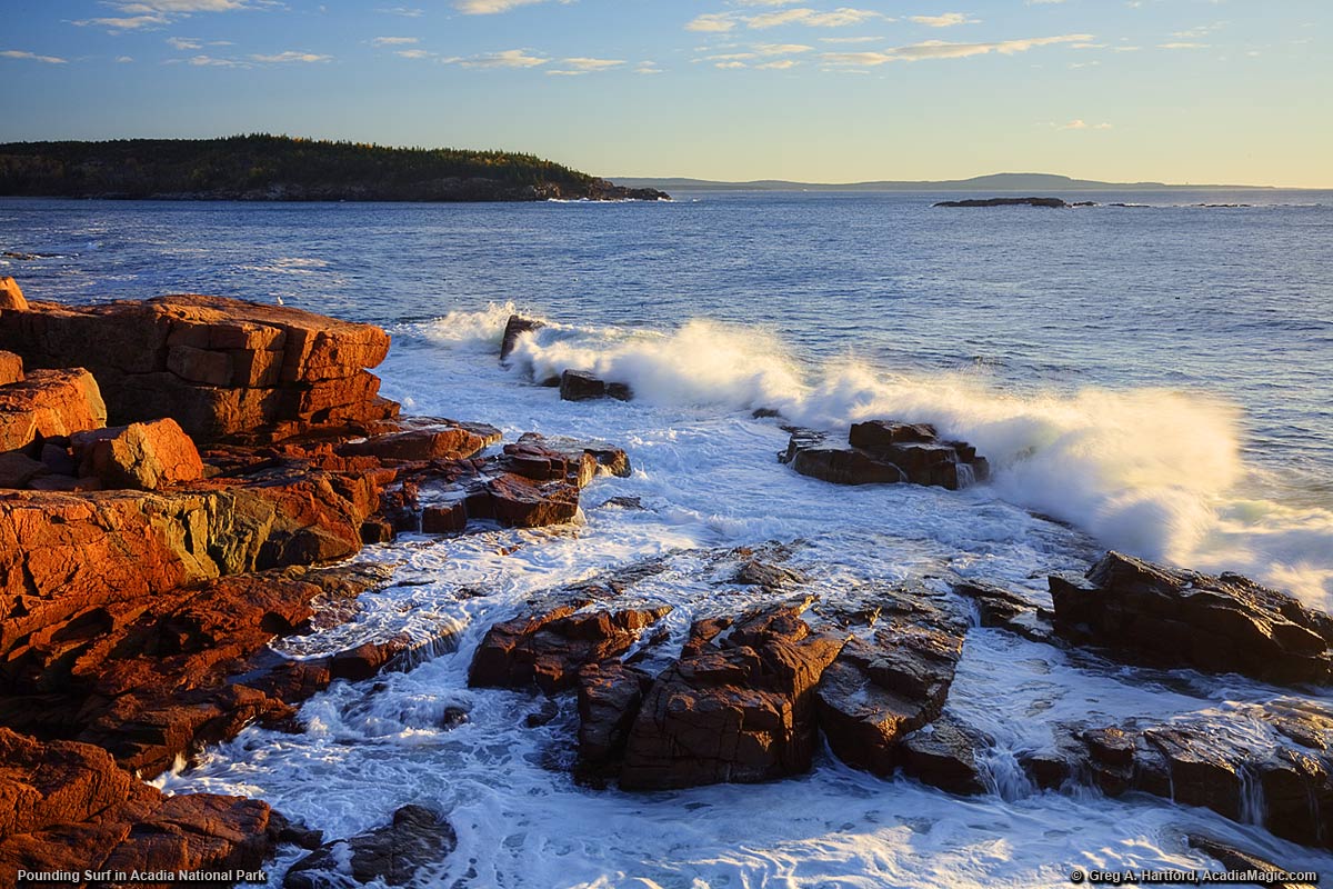 Crashing ocean waves in Acadia National Park at sunrise