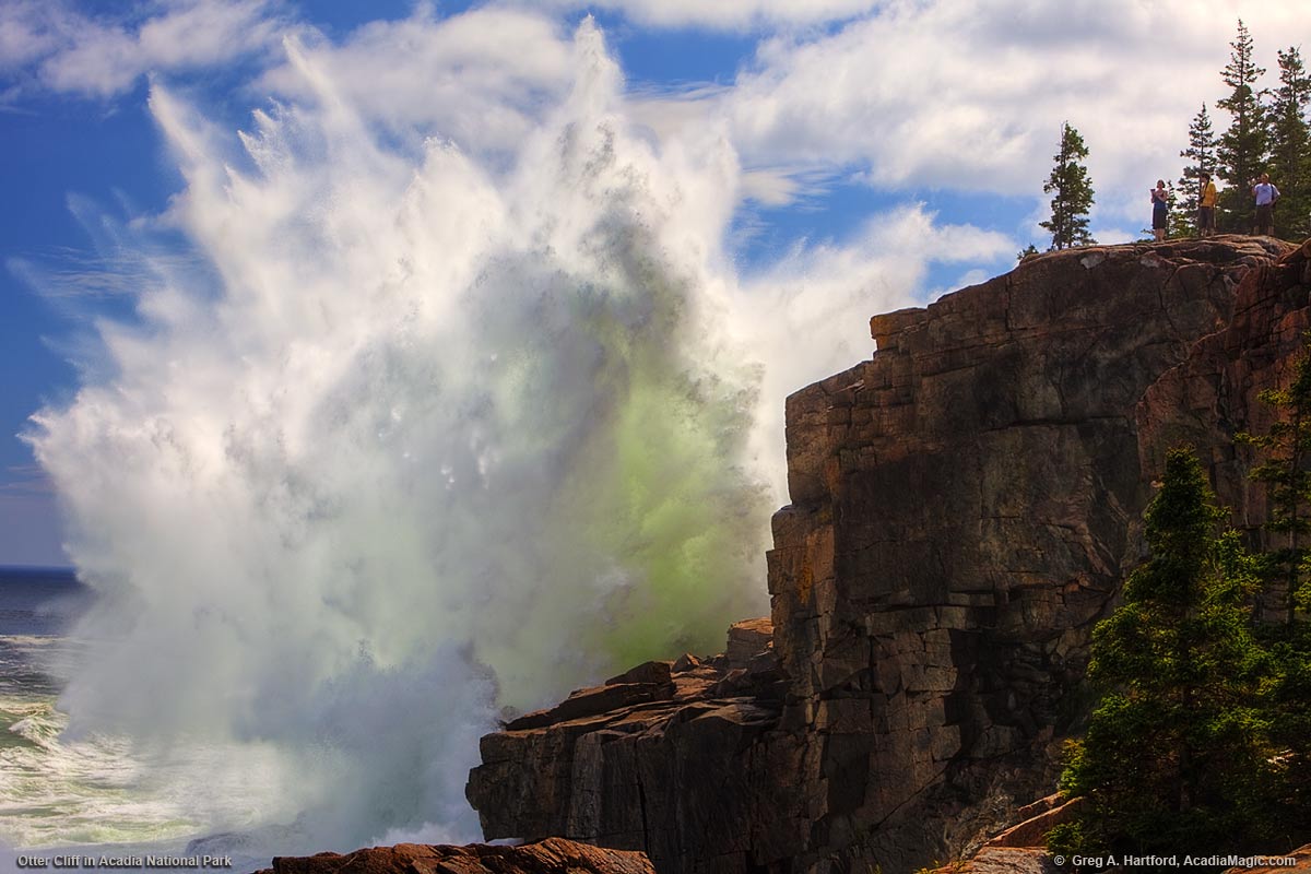 A huge ocean wave slams against Otter Cliff in Acadia National Park.