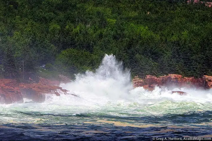 Huge ocean wave slams into coast at Thunder Hole in Acadia