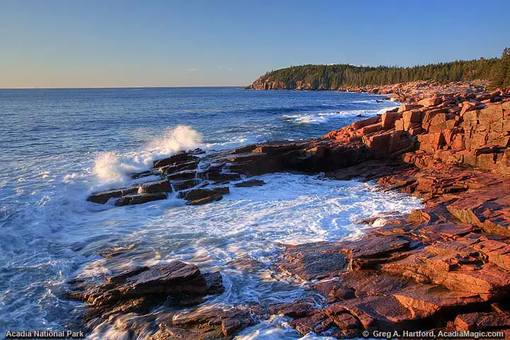 Sunrise view of Otter Cliff seen from Thunder Hole in Acadia