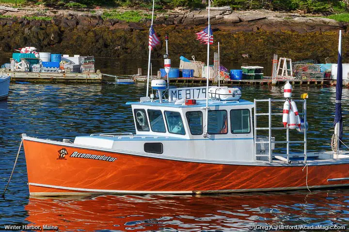 Close-up of lobster boat with buoys attached
