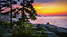 A couple waits for the sunrise in Acadia.