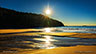 The first light of dawn at Sand Beach in Acadia National Park, Maine